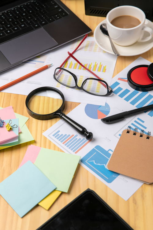 放大鏡數(shù)據(jù)報表辦公用品商務(wù)攝影圖